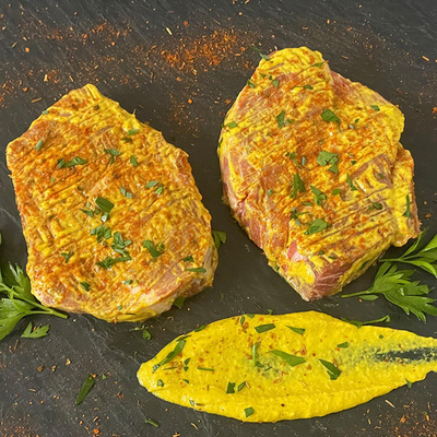 Produktfoto zu Kräutersteaks in Senfmarinade